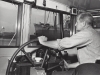 Robert Lester (Dad) piloting the harbor patrol boat on the Willamette River. Date?